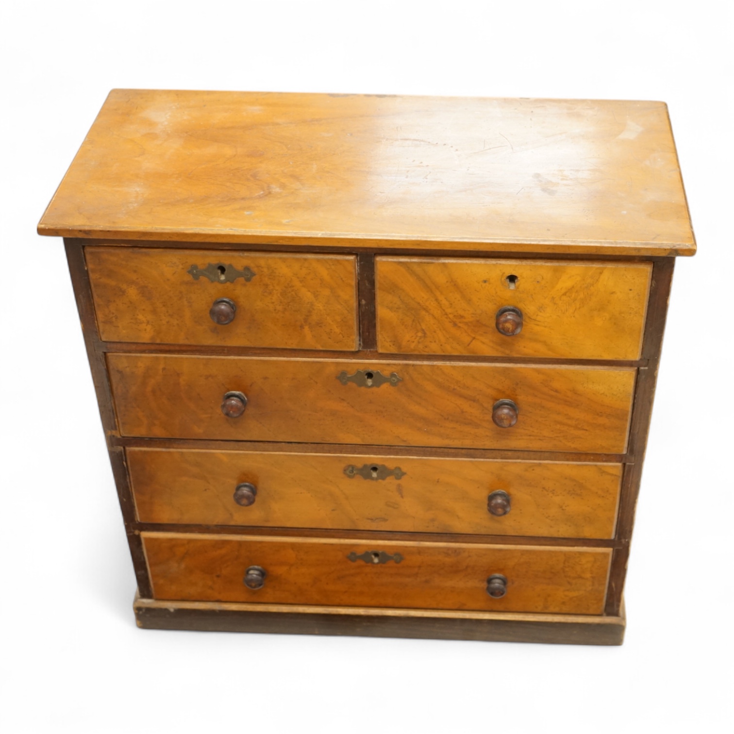 A Victorian walnut table-top chest with five drawers, 39cm high